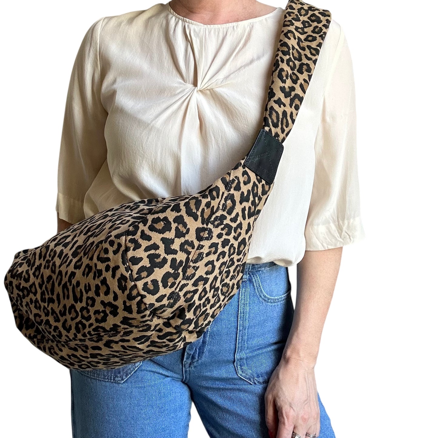 Brixton cross body sling bag - sand leopard print - large