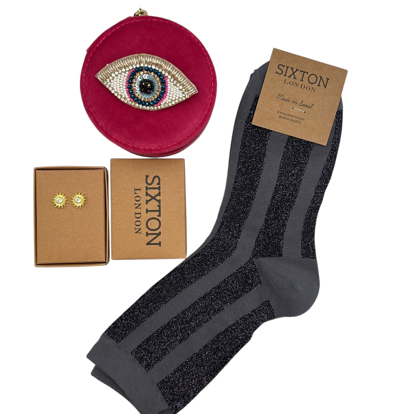 Surprise gift set - a jewellery travel pot with a brooch, pair of socks and jewellery. Over £50 worth of gifts - all for £40.00