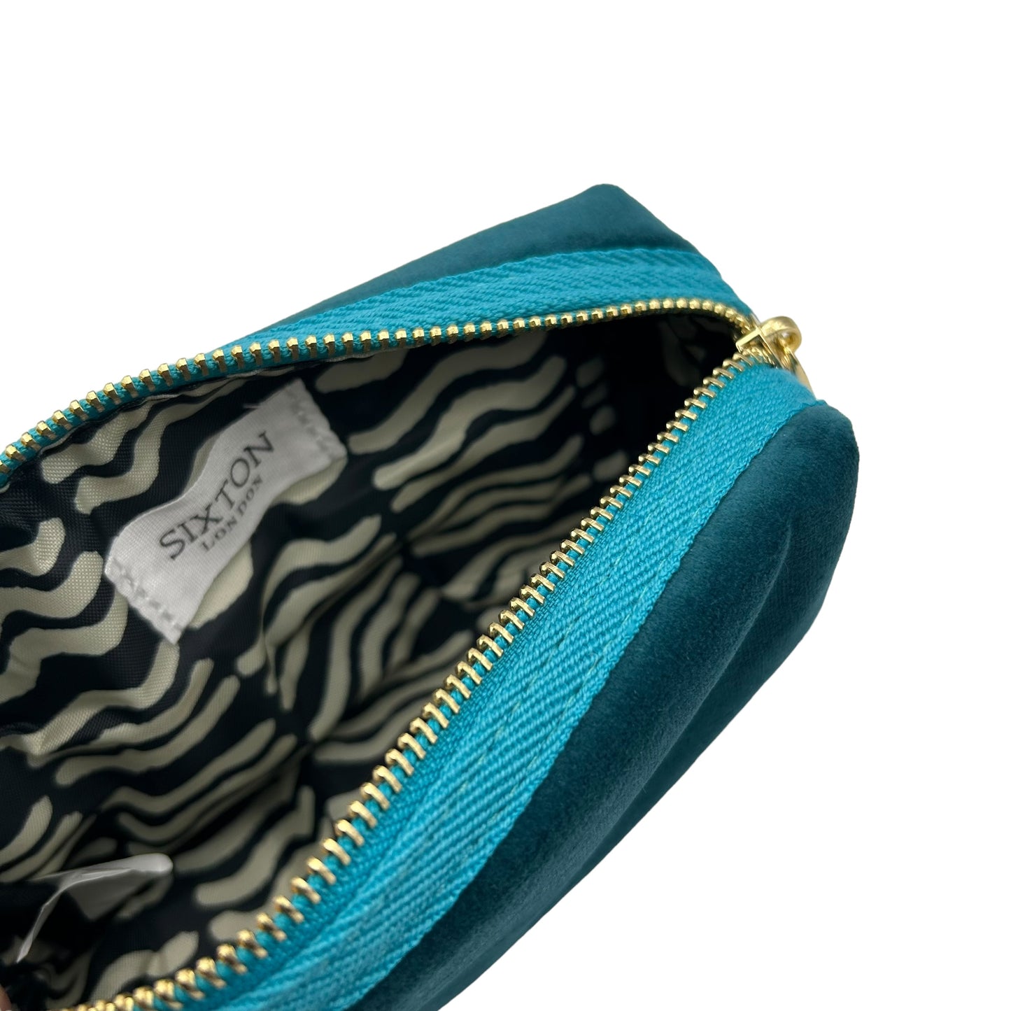 Teal makeup bag with Green Jewelled Insect brooch