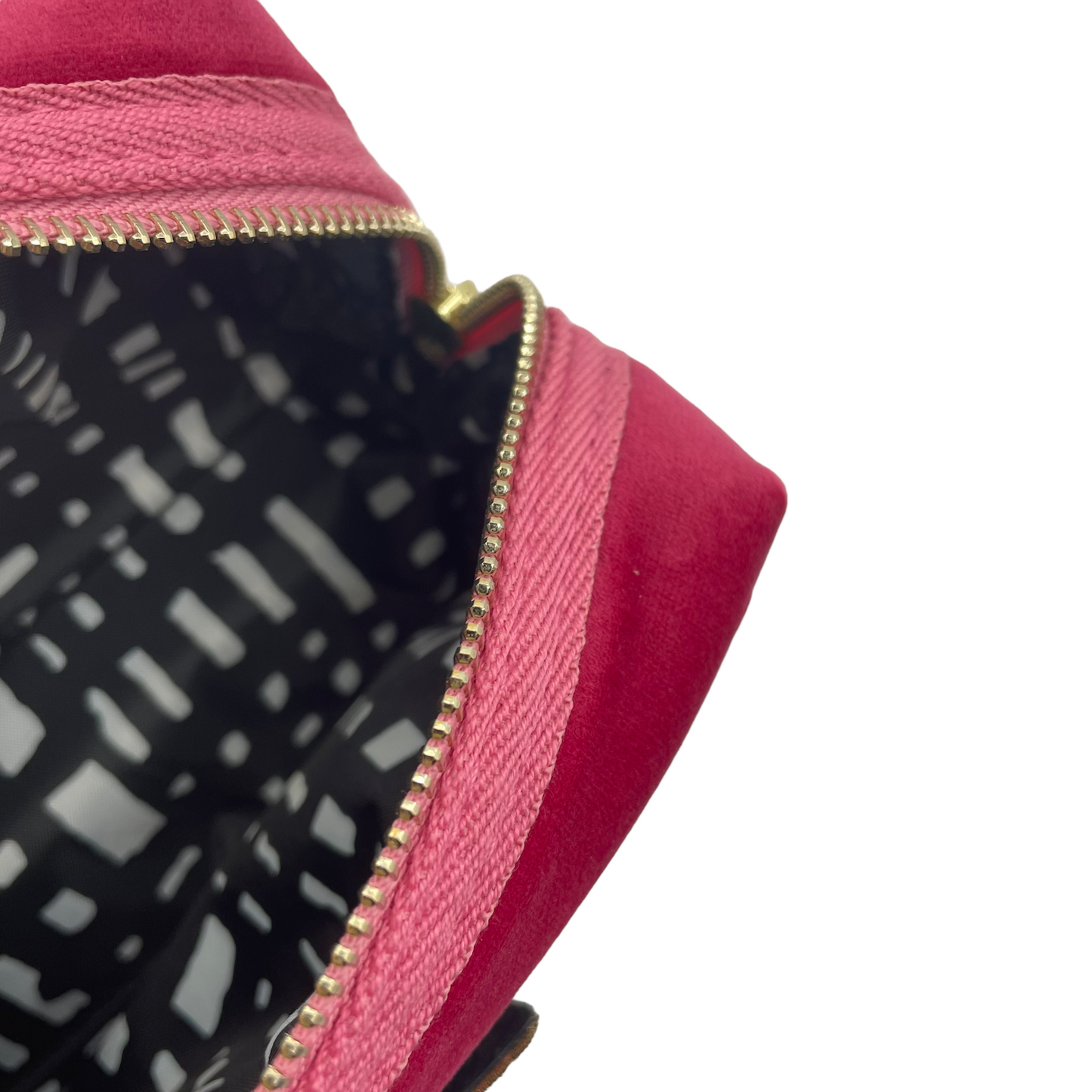 Bright pink makeup bag with Palm Tree brooch
