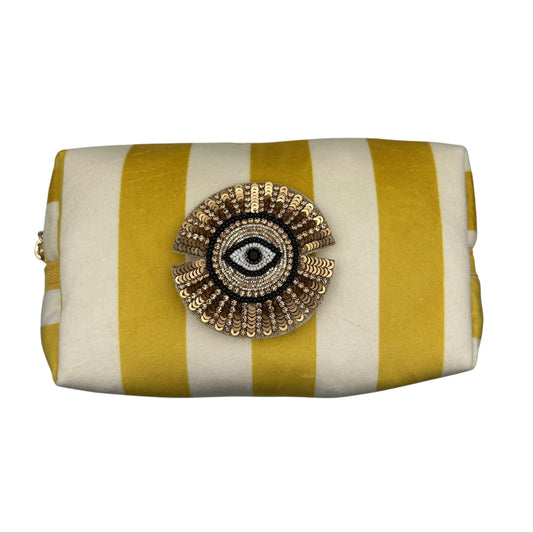 Yellow stripe makeup bag with Sunray Eye pin