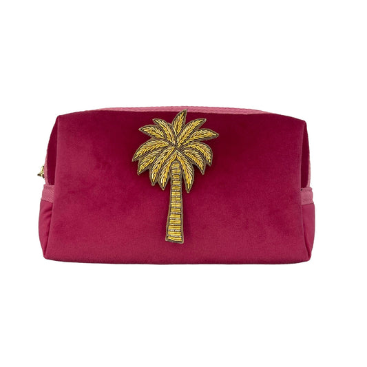 Bright pink makeup bag with Palm Tree brooch